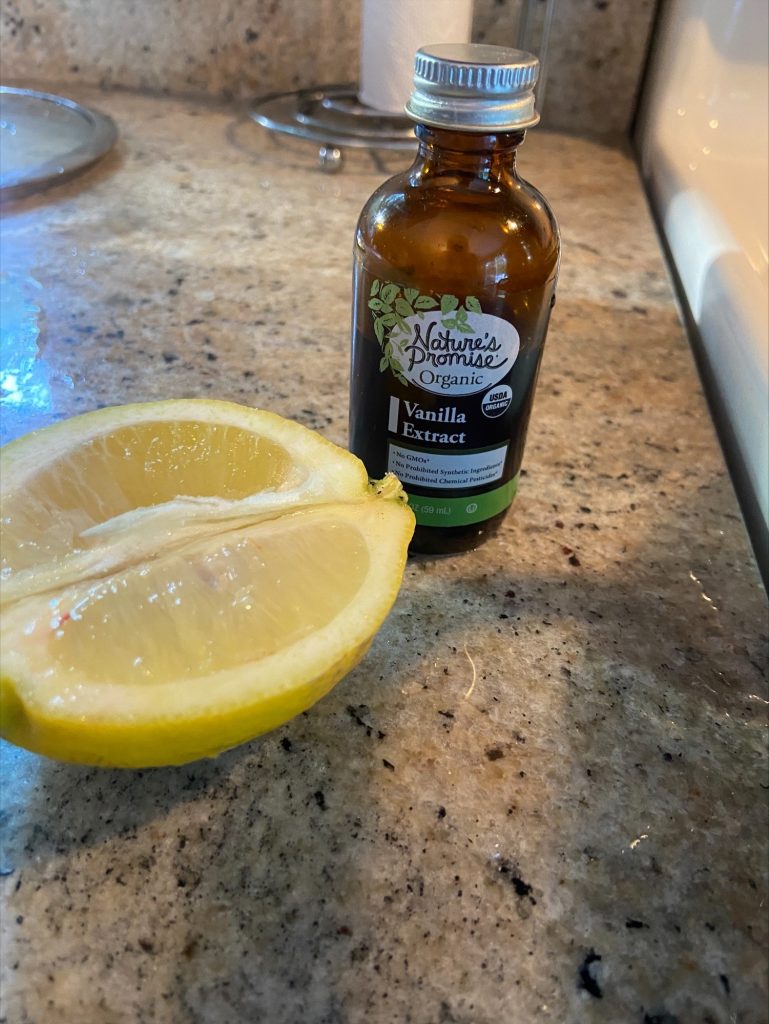 Half a lemon and a bottle of vanilla extract